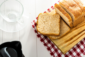loaf bread or whole bread with natural fermentation, in a breakfast scene or afternoon coffee break