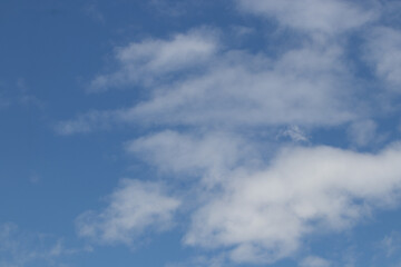 Fototapeta premium Fluffy Clouds on the clear blue sky in Summer
