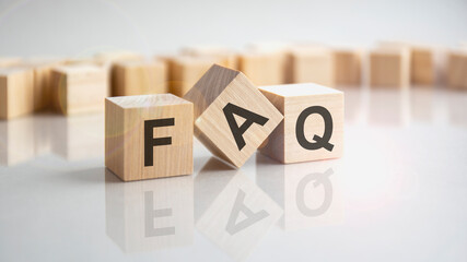 text faq shot form on wooden block