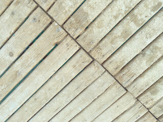 texture, background. wooden sticks on the roof of the house, for the floor and walls of the building. natural texture from logs. boards nailed down