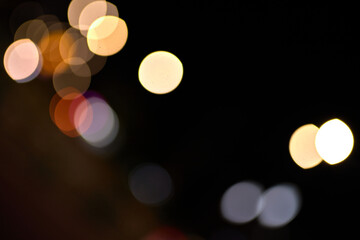 bokeh colored circles of light on black background