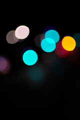 bokeh colored circles of light on black background