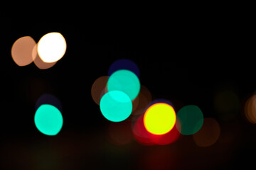 bokeh colored circles of light on black background