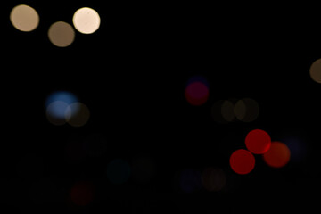 bokeh colored circles of light on black background