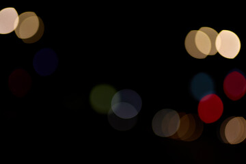 bokeh colored circles of light on black background