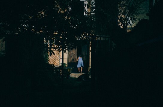 grandmother and elderly women walking in her house on mallorca. majorca, going for dinner.
