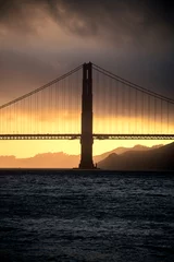 Papier Peint photo Plage de Baker, San Francisco Golden Gate bridge at sunset on a cloudy day