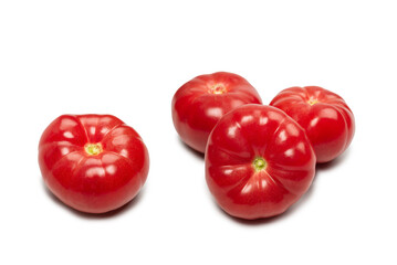 Red fresh tomato isolated on white background.