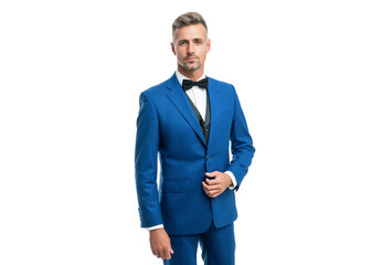 handsome mature man in bow tie blue suit. businessman isolated on white. leader in tux formal wear
