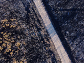 aerial view of a forest burnt in a fire, climate change concept