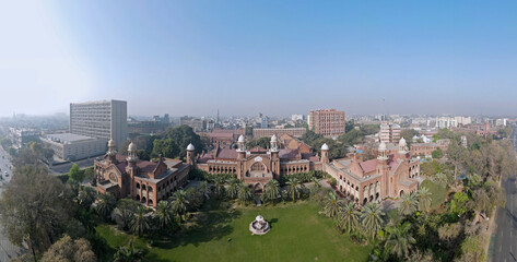 An aerial panorama of Lahore's famous landmarks including Lahore High Court, State Bank building and Mall Road. 
