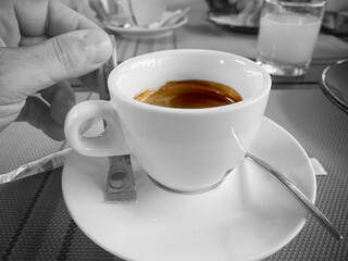 Italian coffee served in a white caramic cup