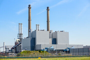 View of a coal-fired power plant under clear sky