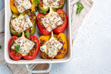 Colorful peppers stuffed with meat and bulgur