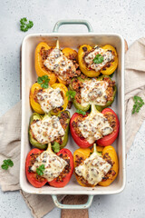 Colorful peppers stuffed with meat and bulgur