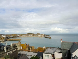 boats in the harbour during high tide. 