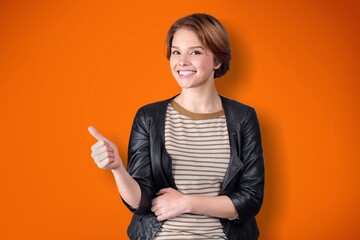 Funny teen student girl posing. Education in high school university college concept.