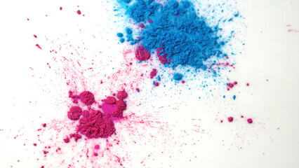 Top view of dry colorful inks falling in white liquid substance. Beautiful iridescent background of...
