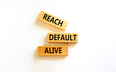 Reach default alive symbol. Concept words Reach default alive on wooden blocks on a beautiful white table white background. Business, finacial and reach default alive concept.
