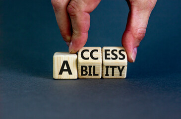 Access and ability symbol. Concept words Access and Ability on wooden cubes. Businessman hand....