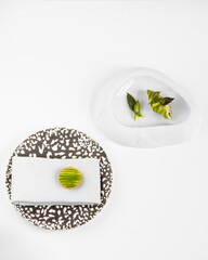 peas on a plate molecular cuisine  unusual white background concept. exquisite delicacies