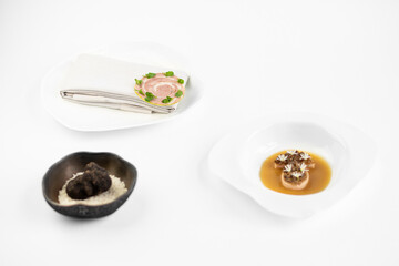 plate with eggs and cheese molecular cuisine  unusual white background concept. exquisite delicacies