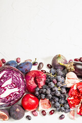 Blue, red and purple food. Culinary background of fruits and vegetables