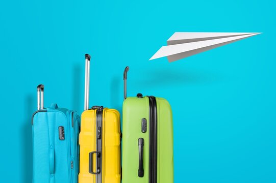 Travel insurance business concept. Airplane and suitcases . Travel insurance covers loss suitcase, flight delays, cancellations, accident and medical expenses.
