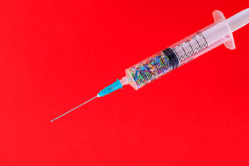 A classic disposable syringe filled with symbolic hearts. Love concept. Background with copy space....
