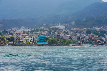 Fototapeta premium Beautiful view of the Atitlan lake in the Guatemala - with small towns and tourist boats