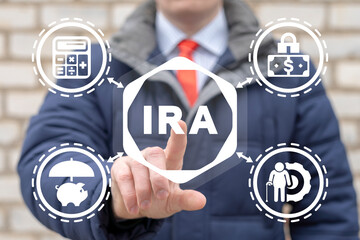 Concept of IRA Individual Retirement Account. Choice of traditional IRA or roth IRA retirement...