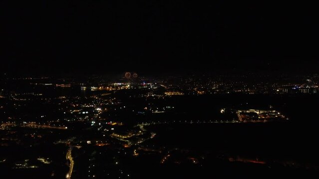 Aerial view on fireworks at night above the city on Bastille Day Toulon 