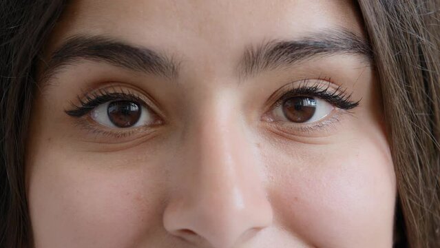 Close up details beautiful human body part female dark eyes make-up black eyeliner arabic middle-eastern woman young girl lebanese islamic lady female patient with long eyelashes good eyesight vision