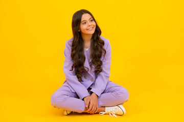 Full length of her she attractive pretty lovely cute cheerful cheery teenager child girl isolated over vivid yellow background. Mock up copy space.