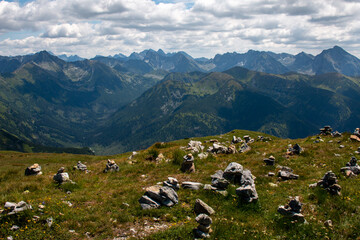 Fototapeta na wymiar The view of the Polish Tatry Mountains near Zakopane from Krzesanica mountain top on Czerwone Wierchy ridge, July, Poland