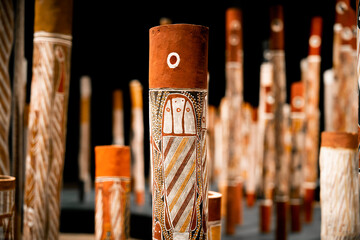 didgeridoos aboriginal indigenous musical instruments in gallery - obrazy, fototapety, plakaty