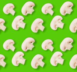 Seamless pattern of champignon slices on green background. Flat lay, top view. Food background. .  Pop art design, creative concept.