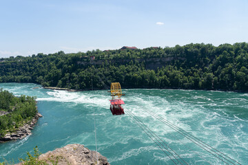 Niagara Falls, ON, Canada - June 30, 2022: Whirlpool Aero Car in Niagara Falls, ON, Canada. The Whirlpool Aero Car or Spanish Aero Car is a cable car located in Niagara Falls, ON.  - obrazy, fototapety, plakaty