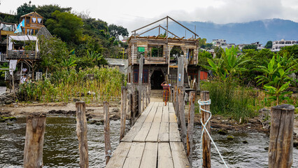 Beautiful view of the traditional Atitlan lake pier in the Guatemala  - with small towns and...