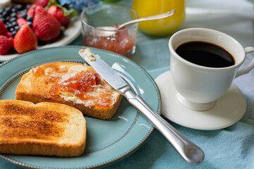Cute breakfast with fruits and coffee in the garden, 