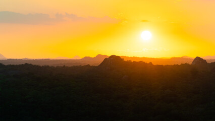Colorful sunset over jungle and rainforest. Sri Lanka.