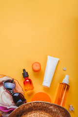 Set of accessories for sun protection on the beach in summer and on vacation, cosmetics, SPF cream