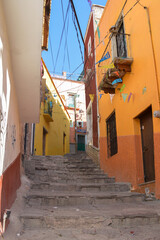 Fototapeta na wymiar colorful houses, stairs, windows and doors leading to the stairs