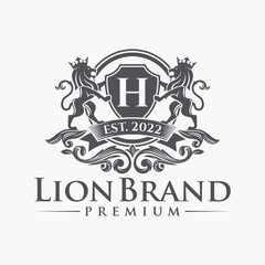 Luxury Lion crest heraldry logo. Elegant gold heraldic shield icon. Premium brand identity emblem. Royal coat of arms company label symbol. Modern vector illustration.
