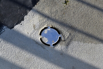 Internal drain from a flat concrete surface on a bridge or building roof - obrazy, fototapety, plakaty