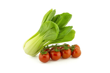Chinese pak choi cabbage and cherry tomato twig