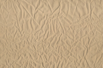 brown paper texture of crumpled craft paper, abstract background