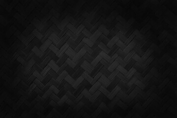 Old black bamboo weave texture background, pattern of woven rattan mat in vintage style.