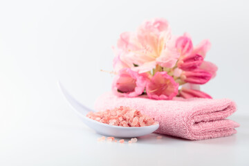 Spa composition with pink Himalayan salt.
