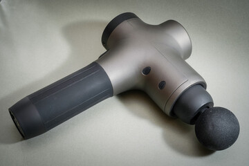 Massage gun, close up foto. 